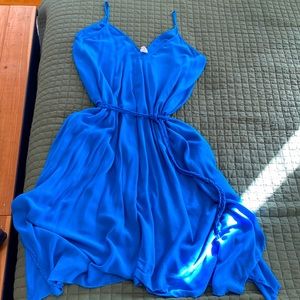 Loose fitting handkerchief dress with a tie